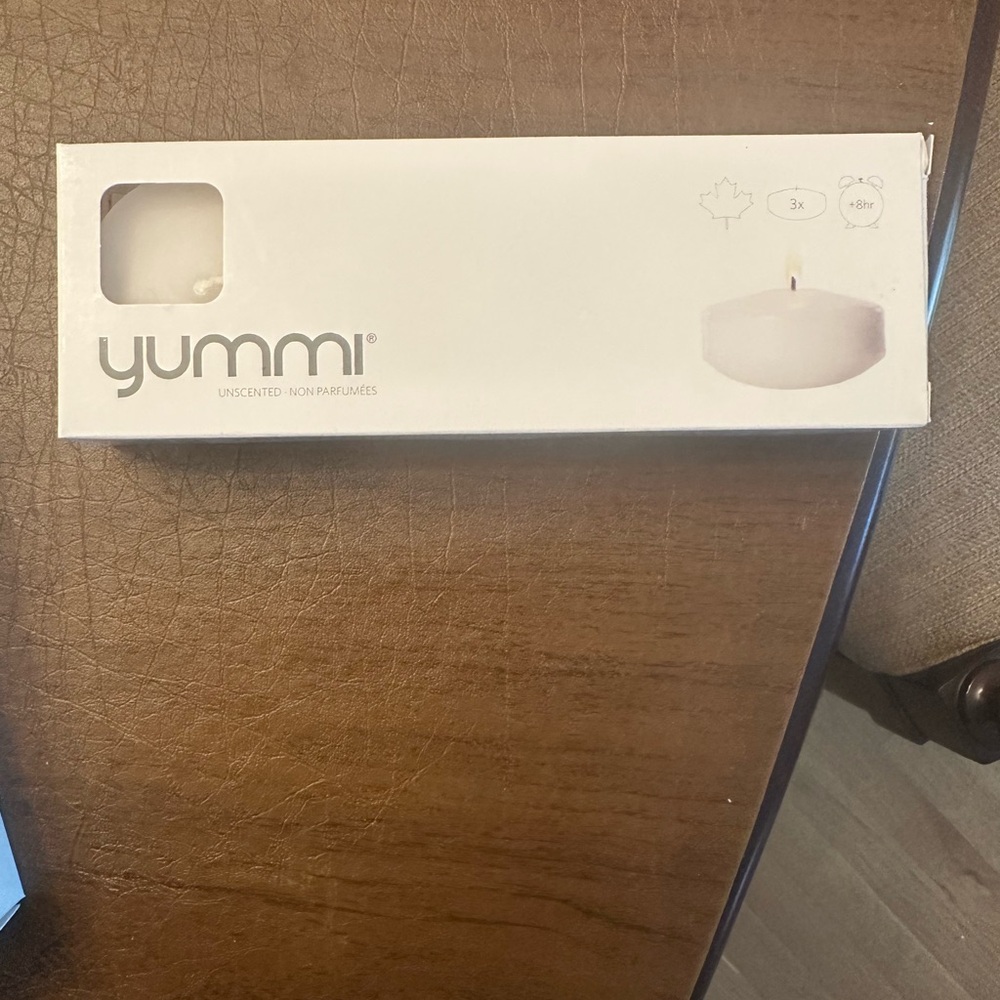 Yummi Unscented White Tealight Candles floating